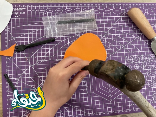 Sewing a mole doll made of leather